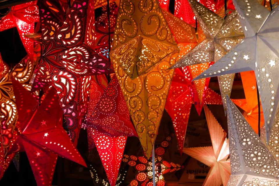 Basel Christmas Market — Colorful paper lanterns illuminate a festive night market atmosphere.