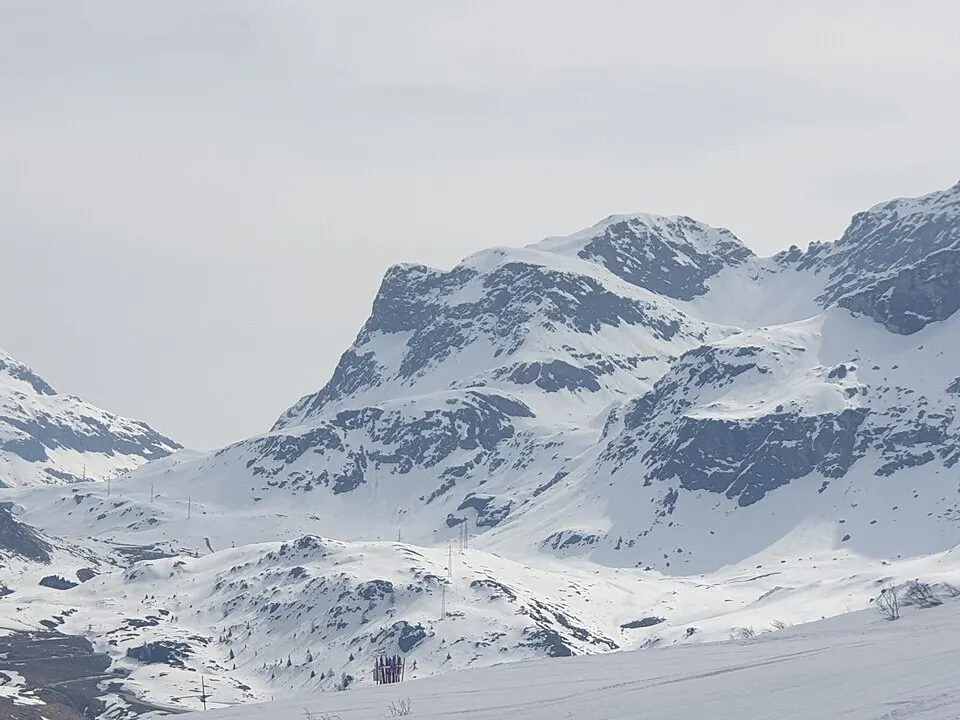 Piz da las Coluonnas as seen from the ski region Bivio