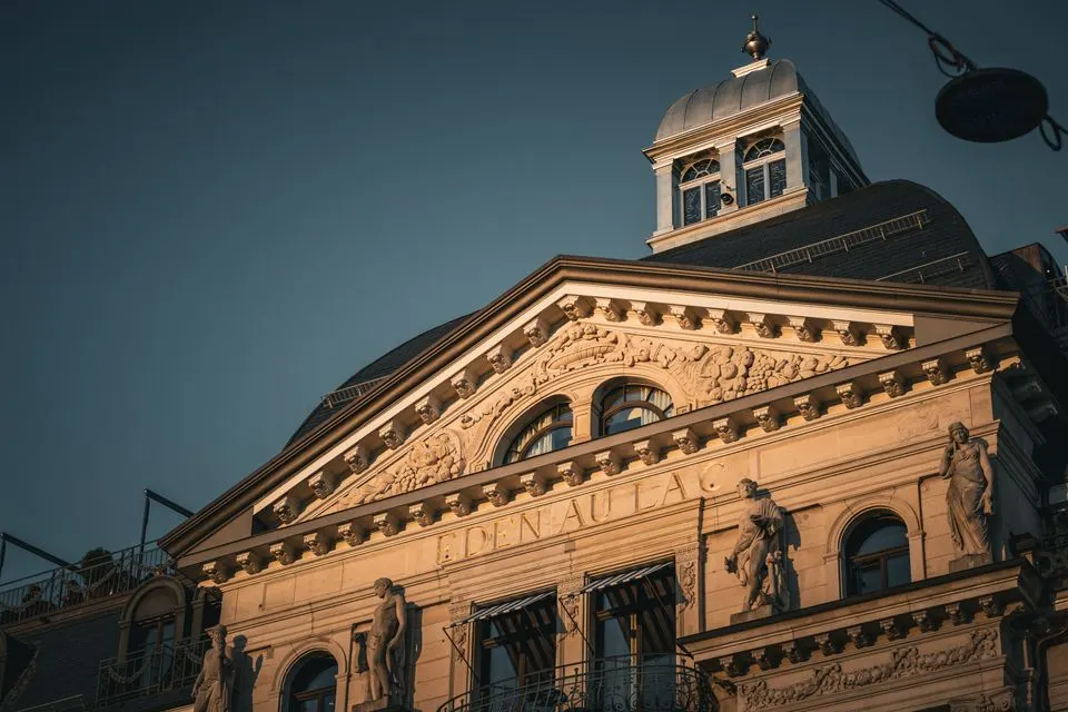Mandarin Oriental Savoy, Zurich — Stunning neoclassical facade of Eden au Lac hotel in Zurich during sunset.