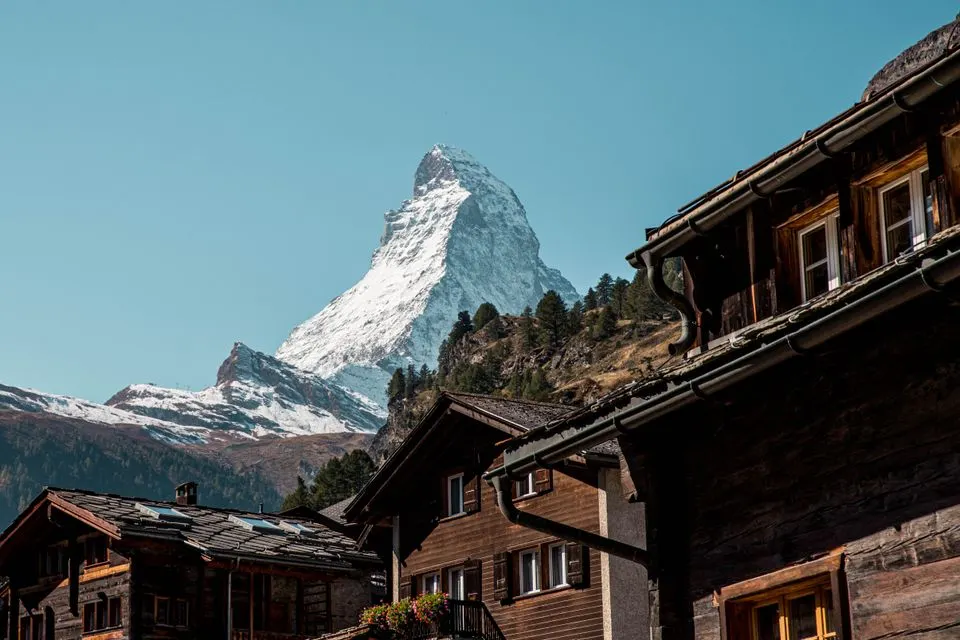 Matterhorn FOCUS — Scenic view of the iconic Matterhorn from a rustic village in Zermatt, Switzerland.