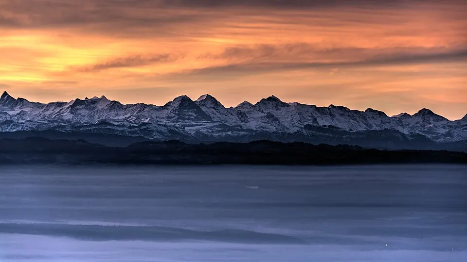 Bernese Alps with Eiger, Mönch and Jungfrau at Dawn seen from Belchen