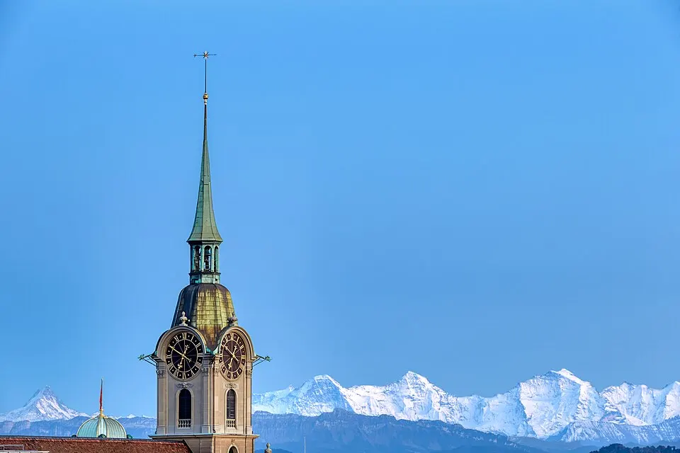Bern Church of the Holy Ghost Spire with Eiger Mönch Jungfrau 2019 10 16 18 50