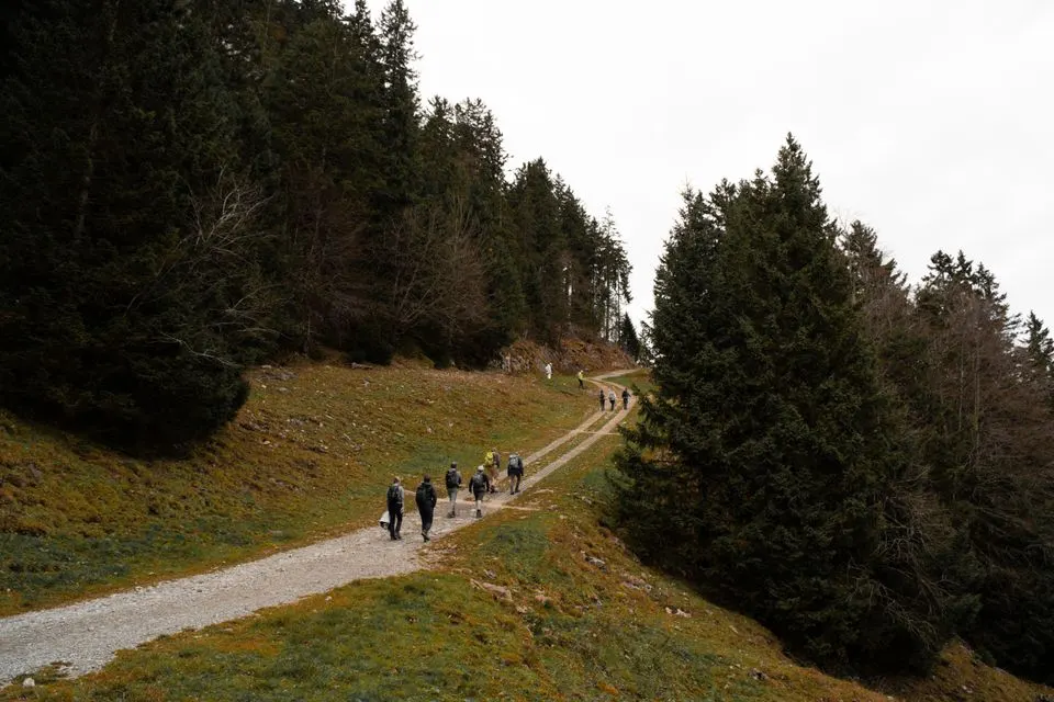 No. 4 ViaJacobi — Group hiking through the picturesque trails in the Swiss Alps during winter.