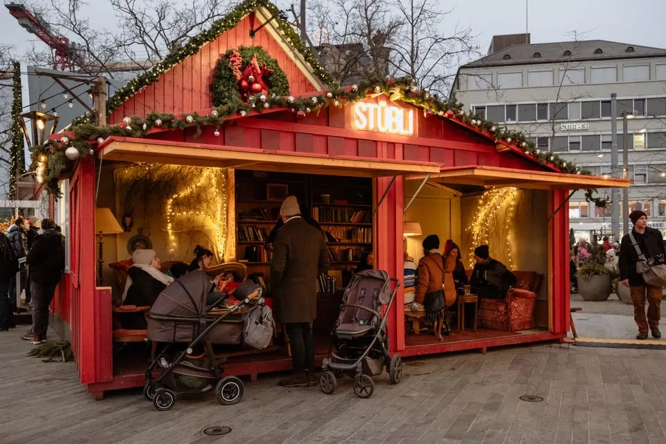 St. Gallen Christmas Market — Explore the lively holiday atmosphere at a Christmas market in Zurich, Switzerland, featuring decorated…